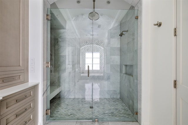 bathroom featuring walk in shower