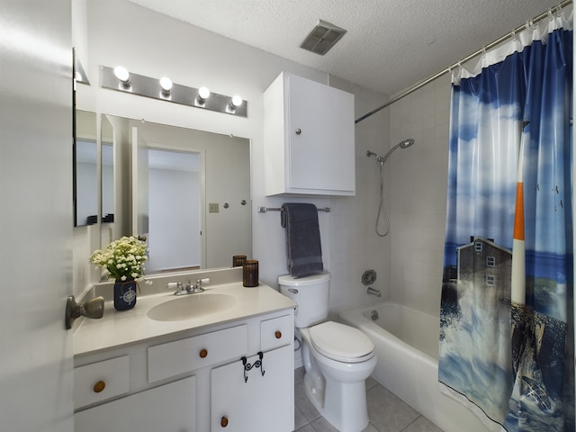 full bathroom with shower / bath combo, tile patterned floors, a textured ceiling, toilet, and vanity