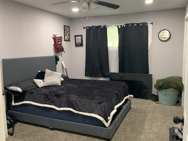 carpeted bedroom with ceiling fan