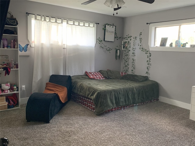 bedroom featuring ceiling fan and carpet floors