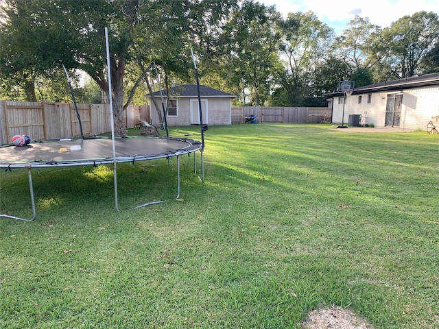 view of yard with a trampoline