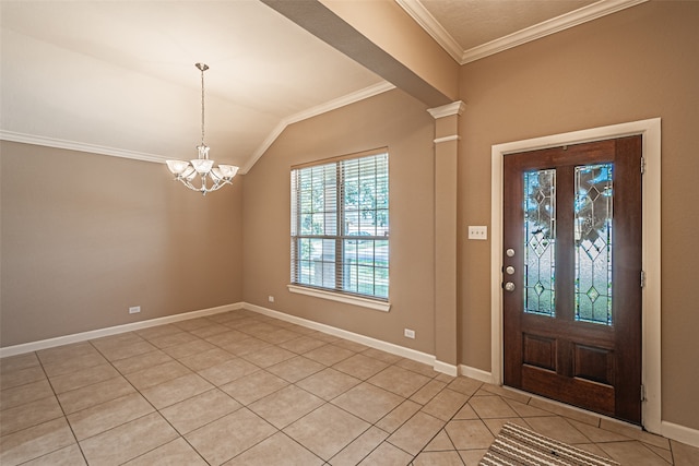 tiled foyer entrance with a chandelier, lofted ceiling, and crown molding