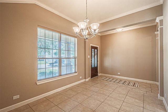 tiled foyer with a notable chandelier and ornamental molding