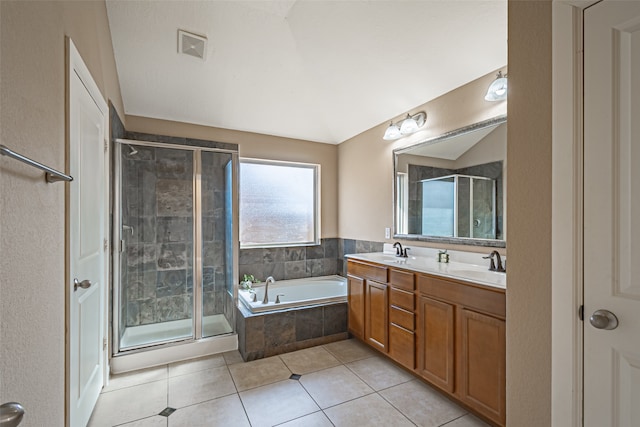 bathroom with separate shower and tub, tile patterned floors, and vanity