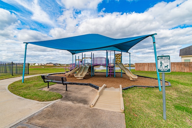 view of jungle gym with a yard