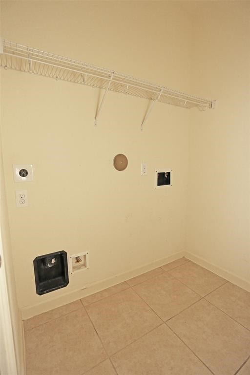 washroom featuring tile patterned floors, electric dryer hookup, and washer hookup