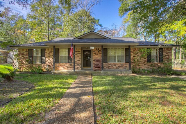 view of front of property with a front lawn