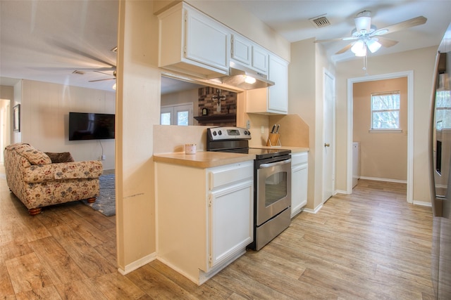 kitchen with ceiling fan, white cabinetry, light wood-type flooring, and stainless steel electric range oven