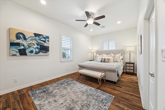 bedroom featuring ceiling fan and dark wood-type flooring