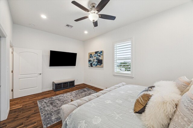 bedroom featuring ceiling fan and dark hardwood / wood-style flooring