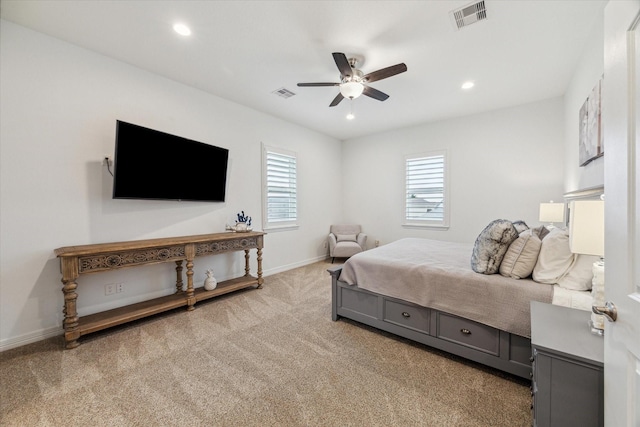 carpeted bedroom featuring ceiling fan