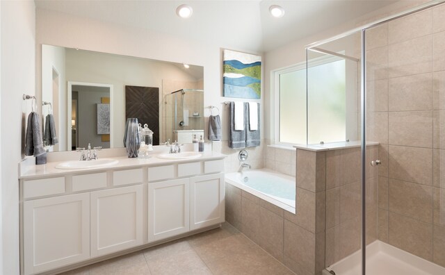 bathroom featuring separate shower and tub, tile patterned flooring, and vanity