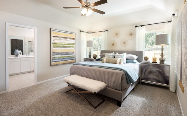 carpeted bedroom featuring ensuite bathroom and ceiling fan