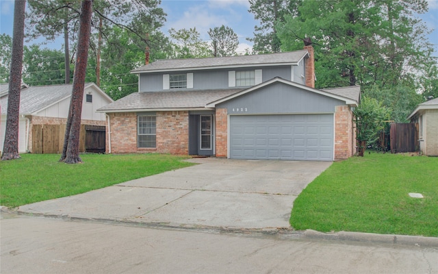 front of property with a garage and a front lawn