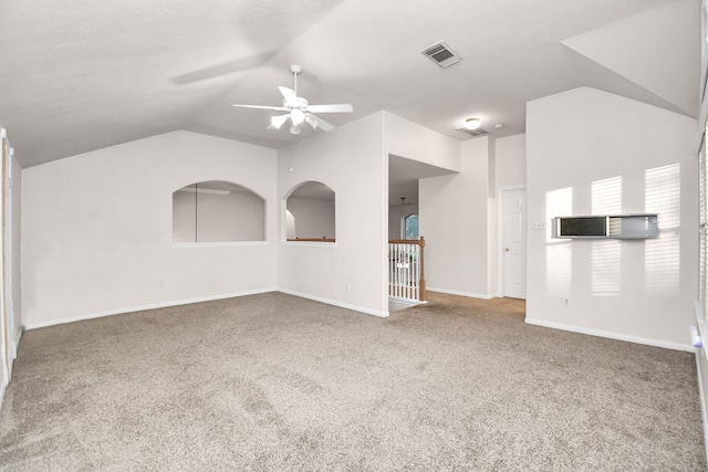 unfurnished living room featuring carpet, ceiling fan, and vaulted ceiling