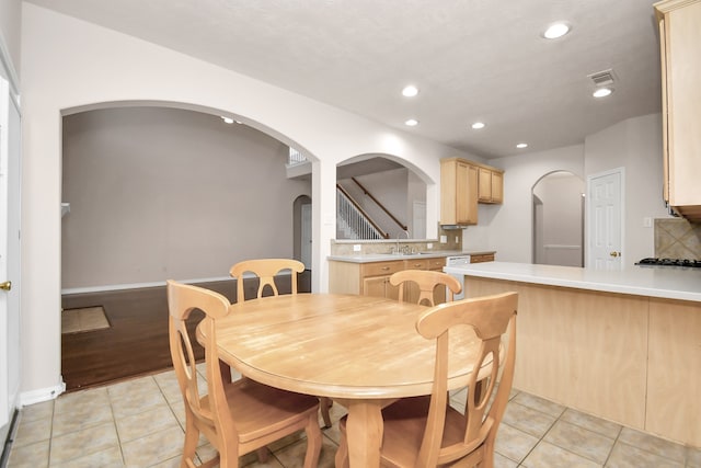 dining area with light hardwood / wood-style flooring