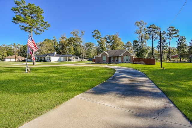 exterior space with a front lawn