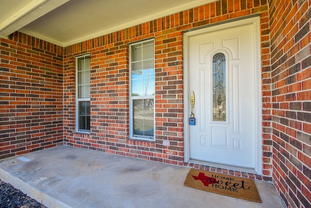 entrance to property with covered porch