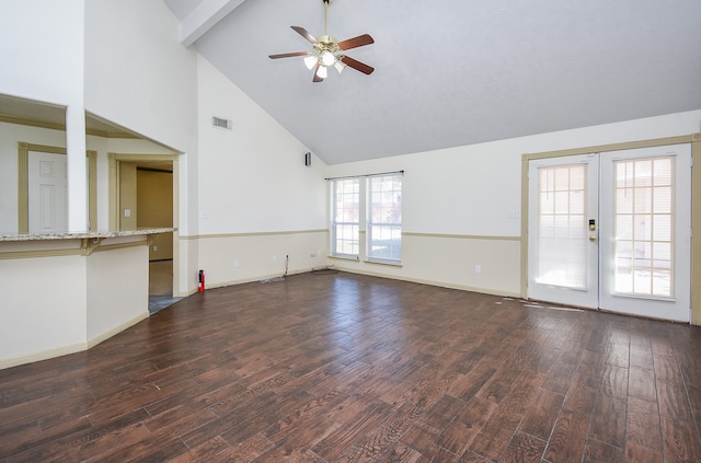 unfurnished living room with french doors, ceiling fan, dark wood-type flooring, beam ceiling, and high vaulted ceiling