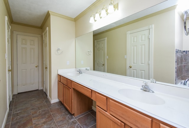 bathroom featuring vanity and crown molding