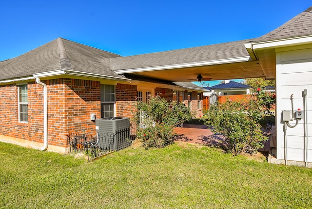 exterior space with ceiling fan and cooling unit