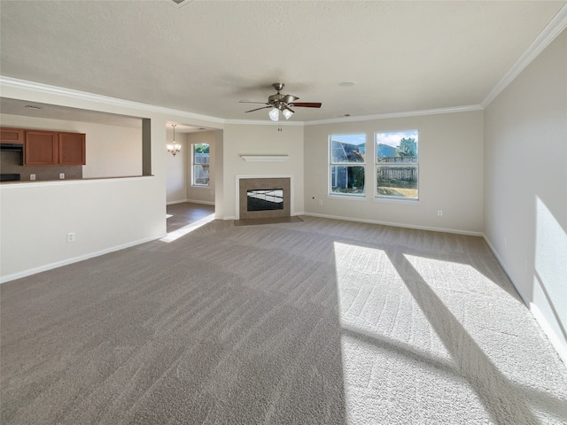 unfurnished living room featuring crown molding, light colored carpet, and ceiling fan with notable chandelier