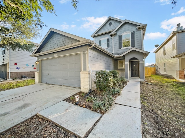 view of front of property featuring a garage