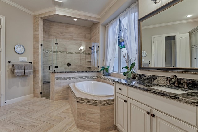 bathroom featuring vanity, ornamental molding, and plus walk in shower