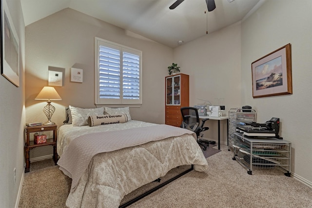 carpeted bedroom featuring ceiling fan and lofted ceiling