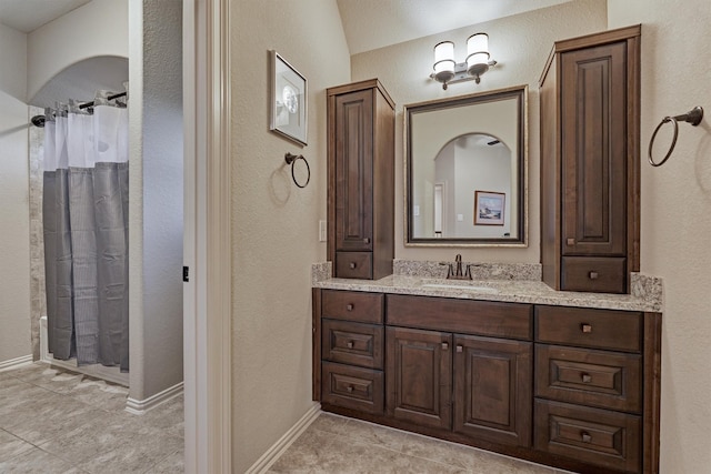 bathroom featuring vanity and tile patterned floors