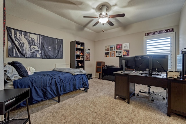 carpeted bedroom featuring ceiling fan