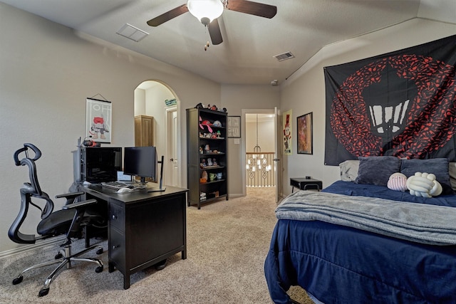 carpeted bedroom featuring ceiling fan and lofted ceiling