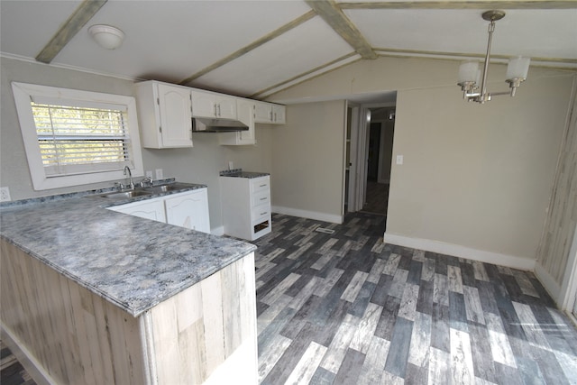 kitchen with hanging light fixtures, an inviting chandelier, vaulted ceiling with beams, dark hardwood / wood-style flooring, and white cabinets