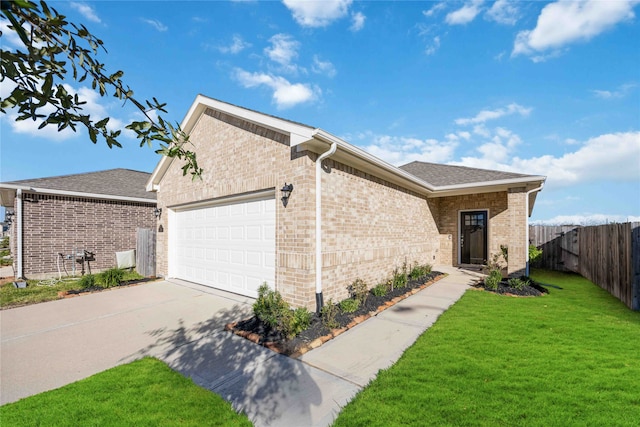 single story home with a garage and a front yard