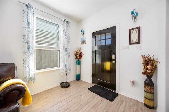 foyer with light hardwood / wood-style flooring