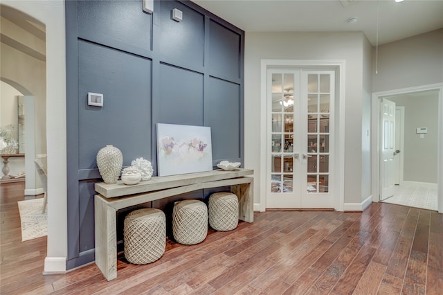 office space featuring wood-type flooring and french doors