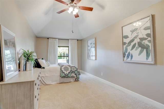 bedroom with light carpet, vaulted ceiling, and ceiling fan