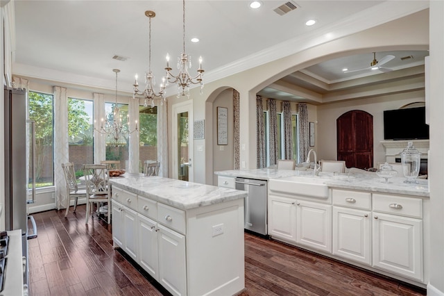 kitchen with a center island with sink, stainless steel dishwasher, white cabinetry, and dark wood-type flooring