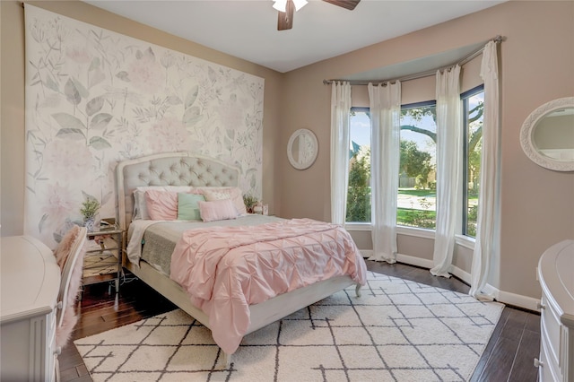 bedroom featuring light hardwood / wood-style floors and ceiling fan