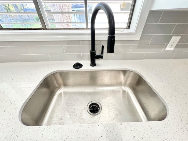 details with sink and tasteful backsplash