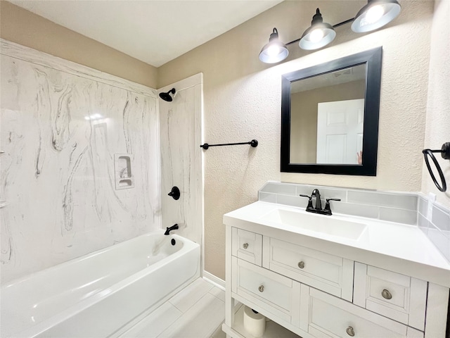 bathroom with vanity and shower / bathtub combination