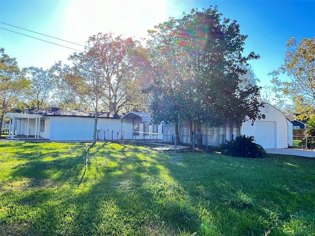 view of front facade with a front yard and a garage