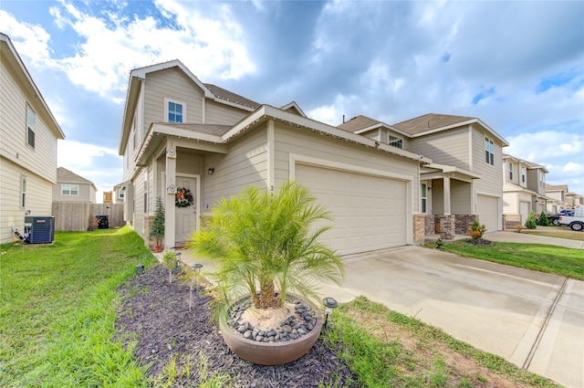 craftsman-style home featuring a garage, a front yard, and central AC