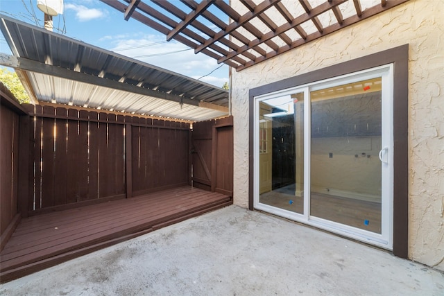 view of patio featuring a pergola and a wooden deck