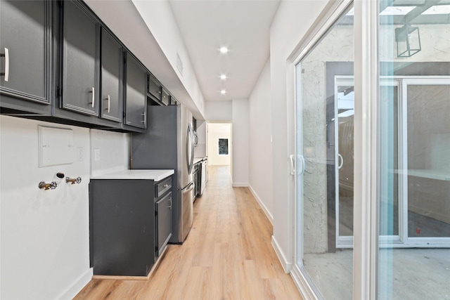 hallway with light wood-type flooring