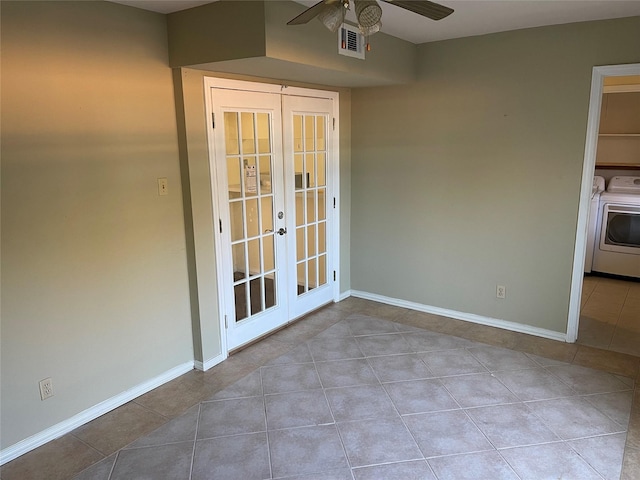 interior space with ceiling fan, french doors, and washer and dryer