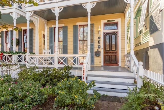 entrance to property with a porch