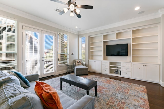 living room featuring crown molding, dark hardwood / wood-style flooring, and ceiling fan