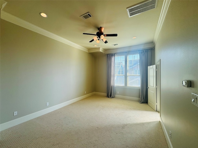 empty room with light carpet, ceiling fan, and ornamental molding