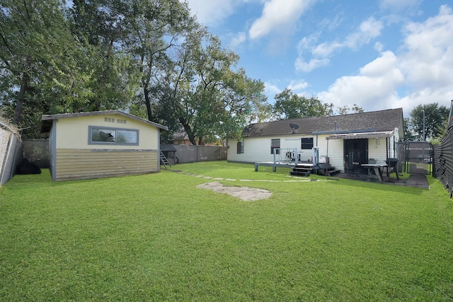 view of yard featuring a deck